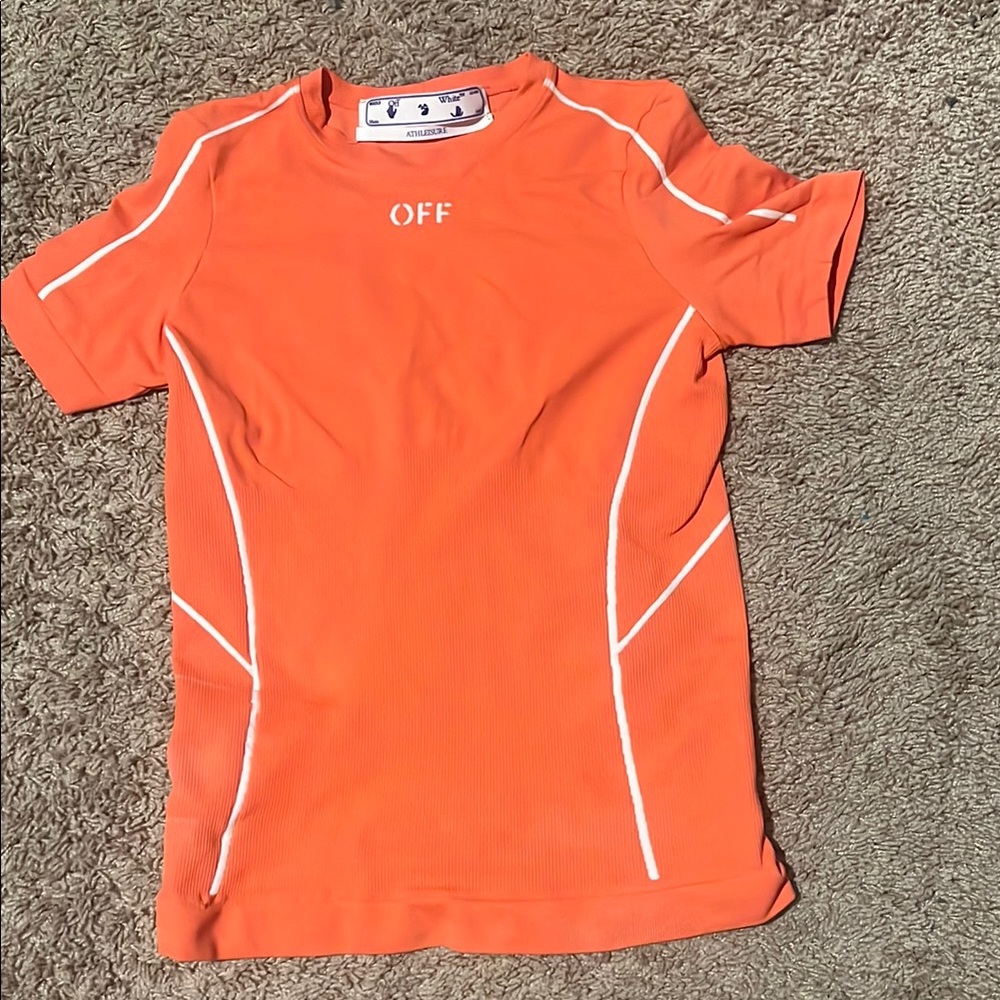 Orange off white top